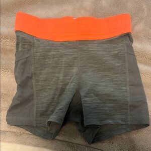 Nike Gray and Orange Athletic Shorts with Moisture-Wicking Fabric